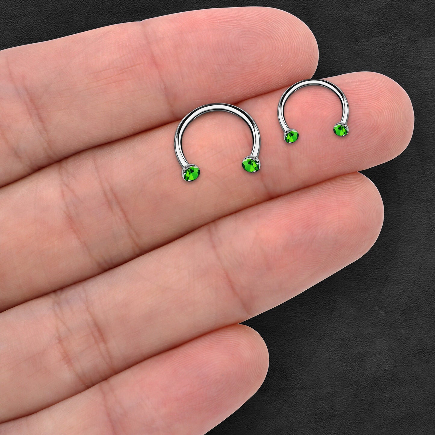 Titanium Horseshoe Ring with Green Crystals