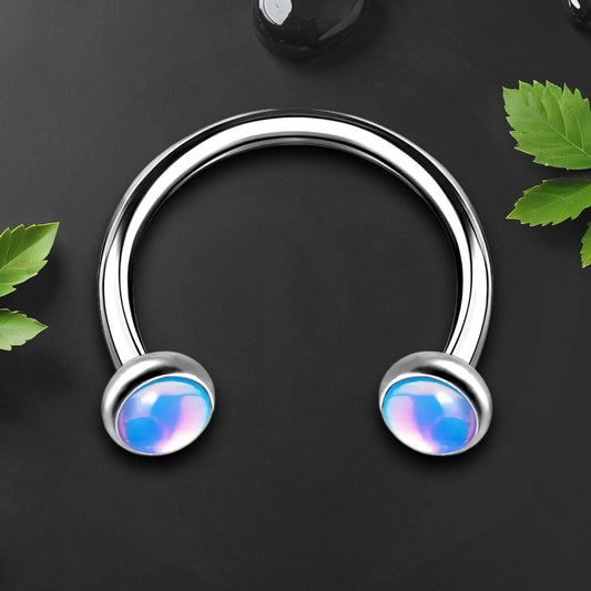 Titanium Horseshoe Ring with Blue Glow Gemstone