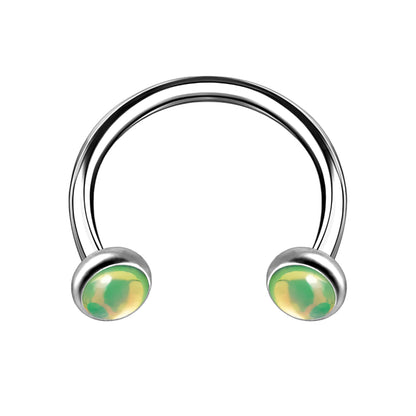 Titanium Horseshoe Ring with Green Glow Gemstone