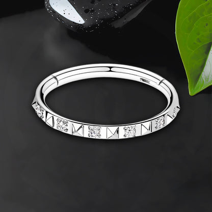 Titanium Clicker Ring with Pyramid Pattern and Zirconia